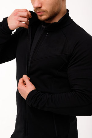 A man with a sporty physique in thermal underwear.の写真素材