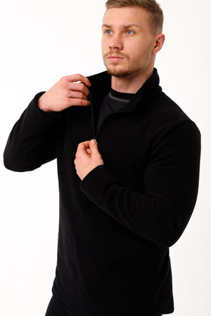 A man with a sporty physique in thermal underwear.の写真素材