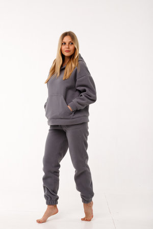 Sporty blonde girl in thermal clothing for womenの写真素材