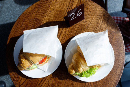 Appetizing croissants with coffee in a coffee shop.の写真素材