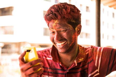 MUMBAI, MAHARASHTRA, INDIA- March 16: A young boy smiling after holi celebration, the Indian...