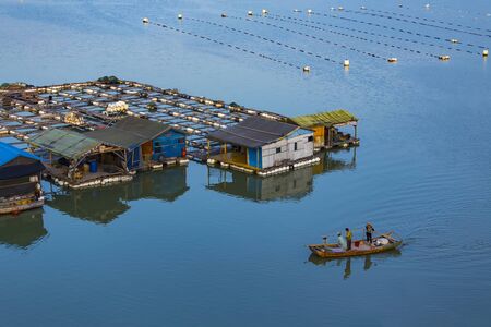 House reflection on waterの写真素材