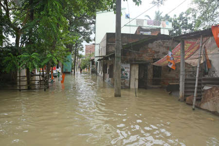 Burdwan Town, Purba Bardhaman District, West Bengal / India - 31.07.2021: Several areas of Burdwan town have been inundated by heavy rains and Banka rivulet water.のeditorial素材