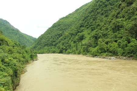 Natural river flowing from Himalaya at rainy season, Nepal beauty