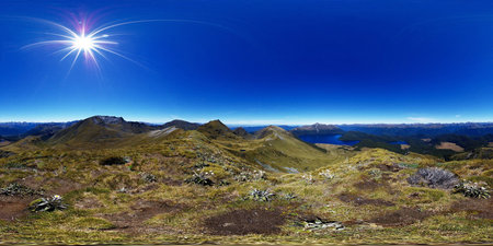Green Lake from the hill-tops above on a clear sky day, Fiordland national park, Southern Alps, New...