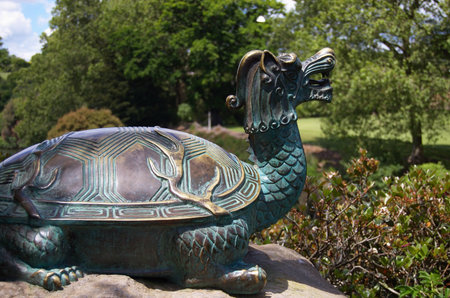Bronze statue of turtle dragon in Chinese Scholars Garden, Paradise Garden Collection, Hamilton Gardens, New Zealandの写真素材