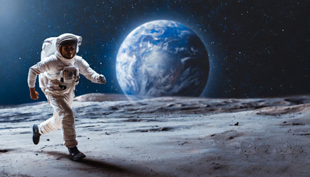 Astronaut running on planet surface. Mixed media. Mixed mediaの素材
