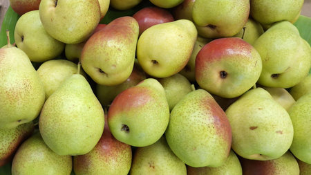 Pears on display at a farmers market in the United States.