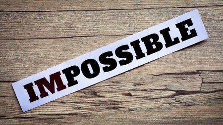 Word impossible. Motivation philosophy concept.Concepts of problem solving, overcoming challenges...