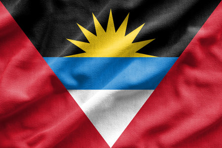 Flag of Antigua. Flag has a detailed realistic fabric texture.の写真素材