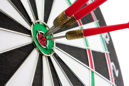 Red arrow is center of target dartboard on white background.,Concept of  successの写真素材