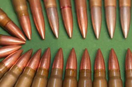 Bullets on the green backgroundの写真素材