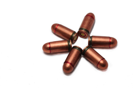 handgun bullets on the white background as a flowersの写真素材