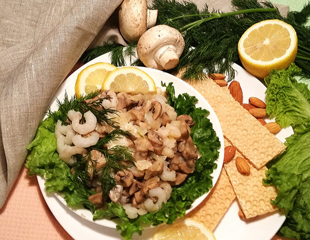 Healthy food. Shrimps, mushroom, almonds and lettuce. Light snack. Healthy products.の写真素材