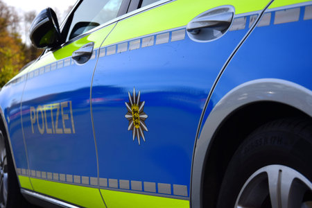 A marked police car in Germany with the word Polizei (police) and the emblem of the federal state Baden-Wuerttemberg.のeditorial素材