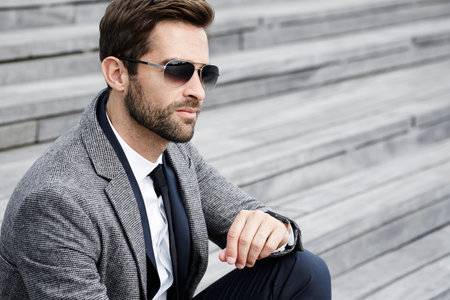 Cool business dude on staircaseの写真素材