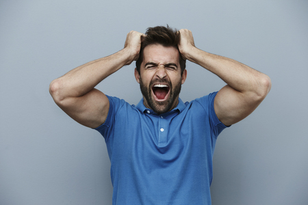 Man screaming at cameraの写真素材