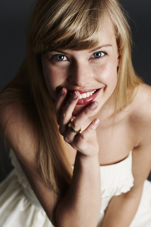 Beautiful blond bride with wedding ring, smilingの写真素材