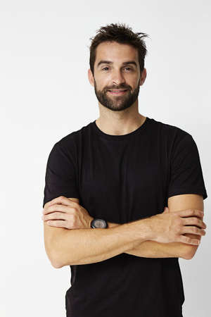 Dude in black t-shirt, looking at cameraの写真素材