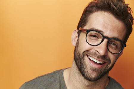 Laughing man in spectacles, portraitの写真素材