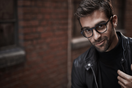 Glasses guy in jacket, portraitの写真素材