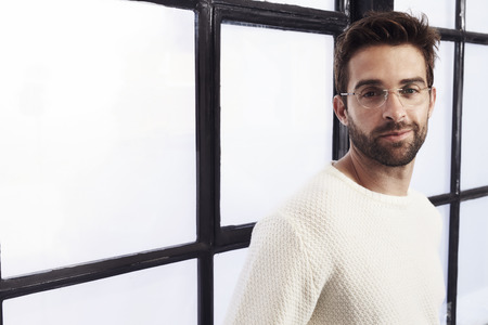 Portrait stubble dude in studioの写真素材