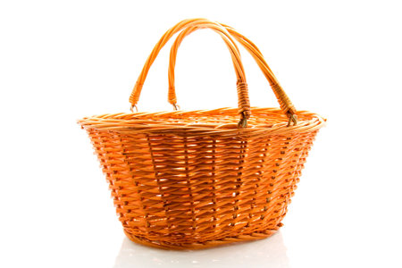 cane basket isolated on white backgroundの写真素材