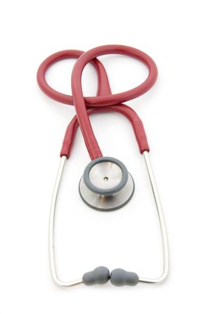 Red stethoscope isolated on white backgroundの写真素材