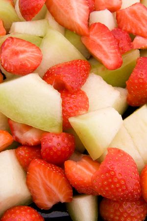 strawberry and melon in closeupの写真素材