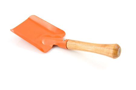 garden tool: orange shovel isolated on white backgroundの写真素材