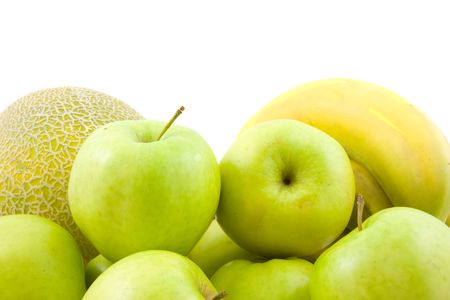 lots of fruit: apples, bananas and melon over white backgroundの写真素材