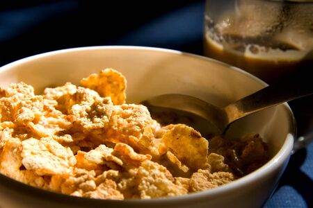 Bowl with cornflakes in the morning ready to eatの写真素材