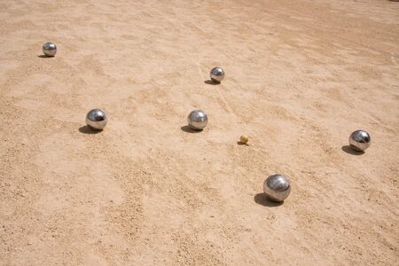 Game of jeu de boule, silvermetal  balls in sand. A french ball gameの写真素材