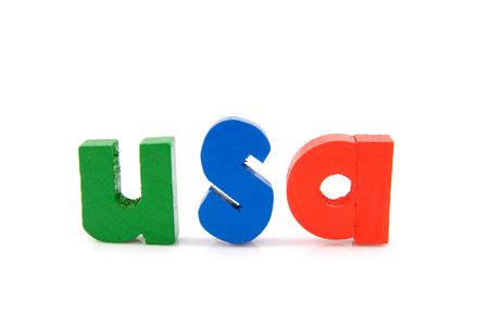 word USA in wooden colorful letters, isolated on white backgroundの写真素材