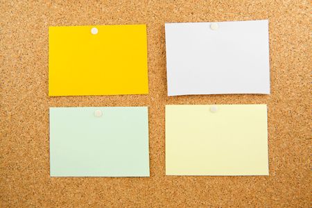 Memobord in closeup with empty colored post-itの写真素材