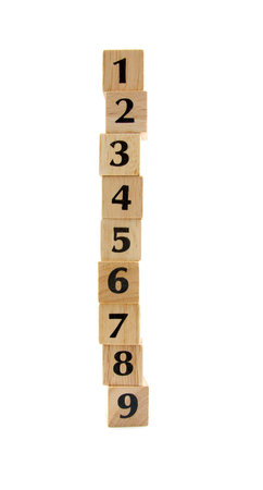 stacked wooden blocks with numbers 1 to 9 isolated on white background