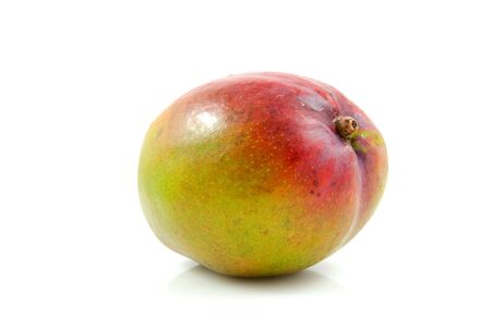 Fresh mango fruit isolated on white backgroundの写真素材