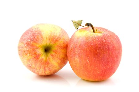 two fresh juicy apples with waterdrop isolated on white backgroundの写真素材