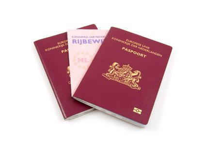 Dutch drivers licence and passport isolated on white backgroundの写真素材