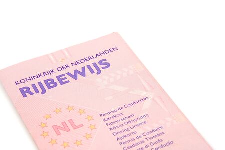 Dutch pink drivers licence isolated on white backgroundの写真素材