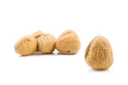 some walnuts isolated on white backgroundの写真素材
