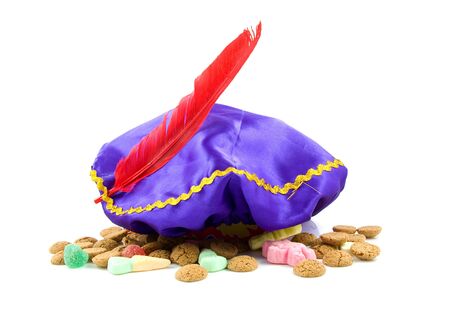 purple hat with red feather of Zwarte Piet and ginger nuts, typical Dutch event in decemberの写真素材