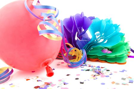 balloon and party streamers for birthday over white backgroundの写真素材