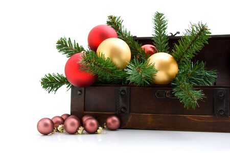 wooden box with christmas decoration over white backgroundの写真素材