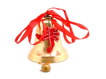 Golden christmas bell with red ribbon over white backgroundの写真素材