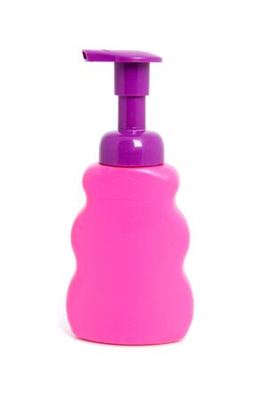 Pink soap bottle with pump isolated on white backgroundの写真素材