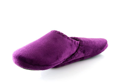 Pair of purple slippers isolated on white backgroundの写真素材