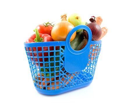 Blue plastic shopping bag with grocery over white backgroundの写真素材