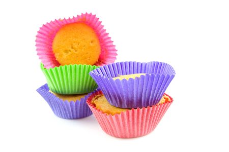 stack of colorful home baked cupcakes over white backgroundの写真素材
