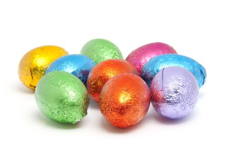 colorful chocolate easter eggs isolated on white backgroundの写真素材